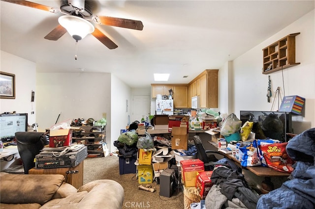 miscellaneous room featuring ceiling fan and carpet flooring