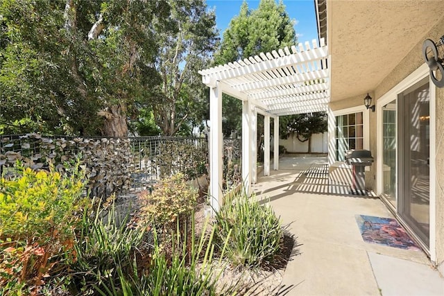 view of patio / terrace featuring a pergola