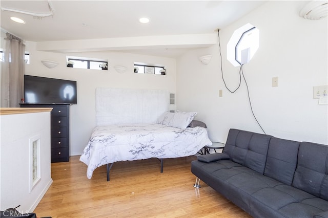 bedroom with hardwood / wood-style floors