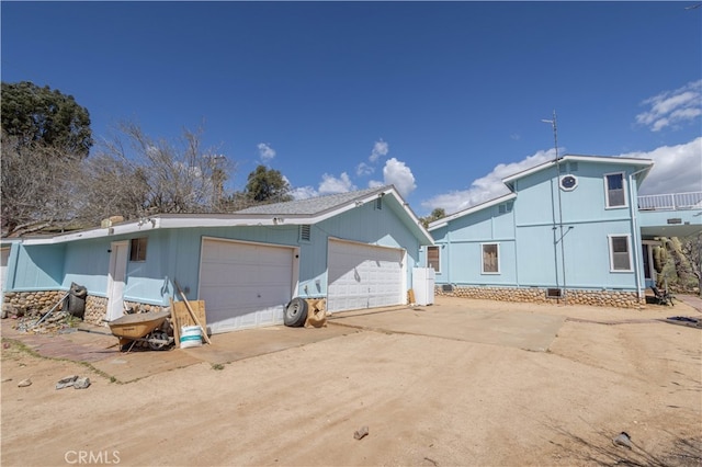 exterior space featuring a garage