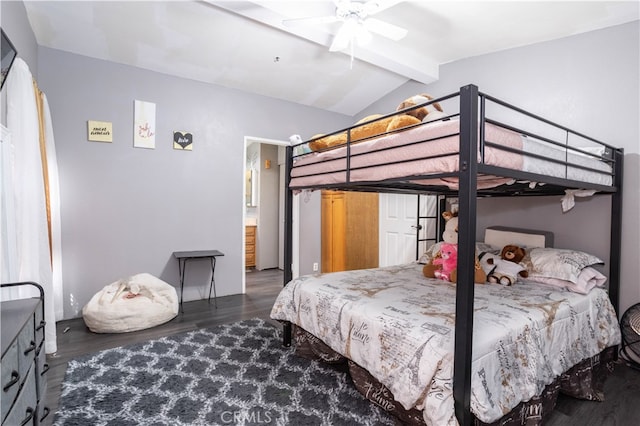 bedroom with vaulted ceiling with beams, ceiling fan, and dark hardwood / wood-style flooring