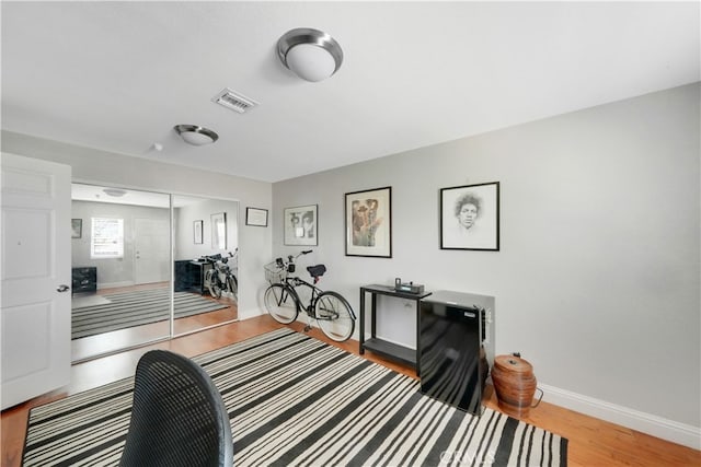 interior space with hardwood / wood-style floors