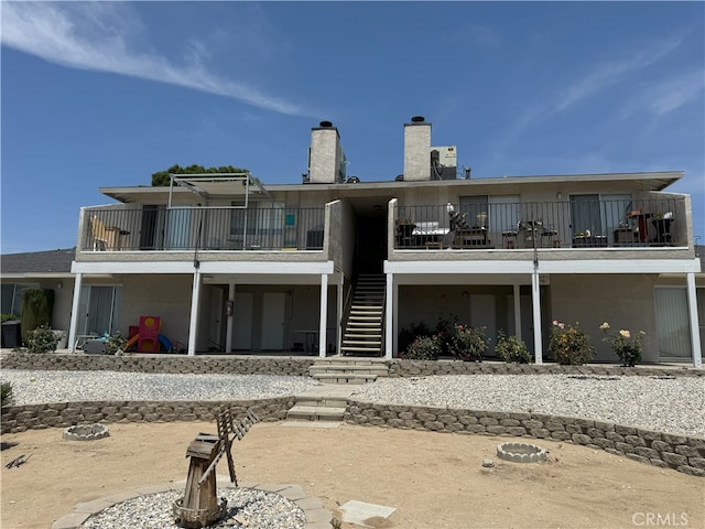 rear view of property with a patio area