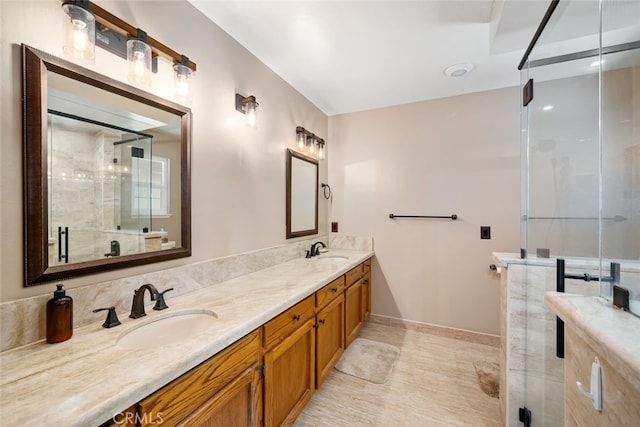 bathroom with vanity and an enclosed shower