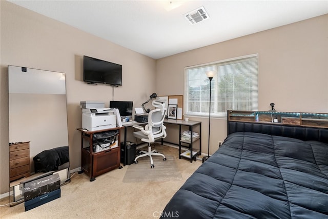 bedroom with light carpet