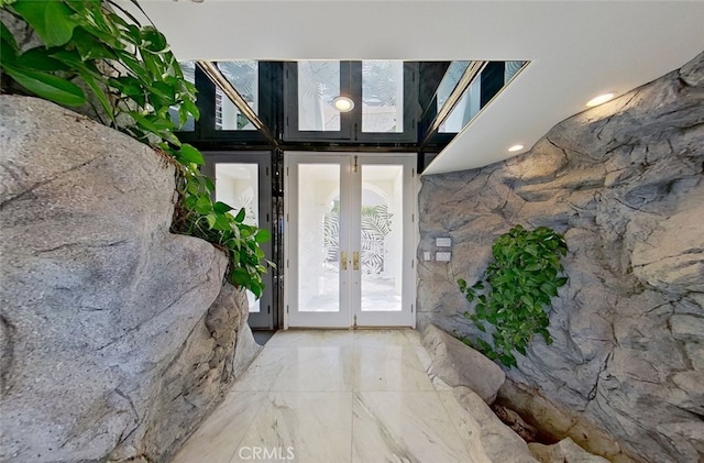 property entrance featuring french doors