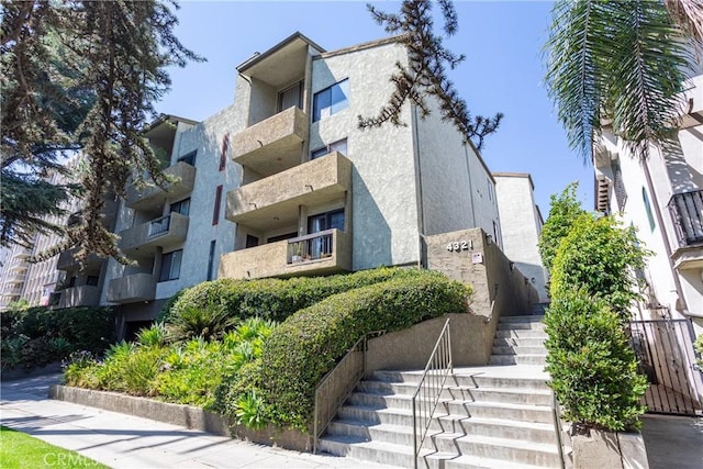 view of property with stairway