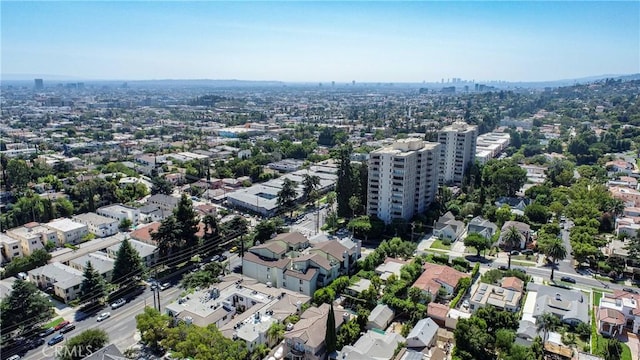 birds eye view of property with a view of city