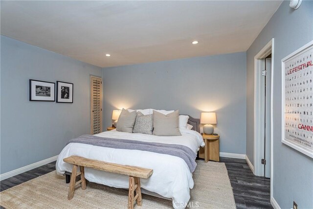 bedroom featuring dark wood-type flooring