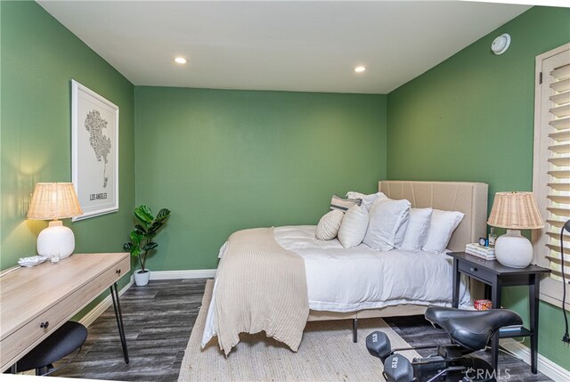 bedroom featuring dark wood-type flooring