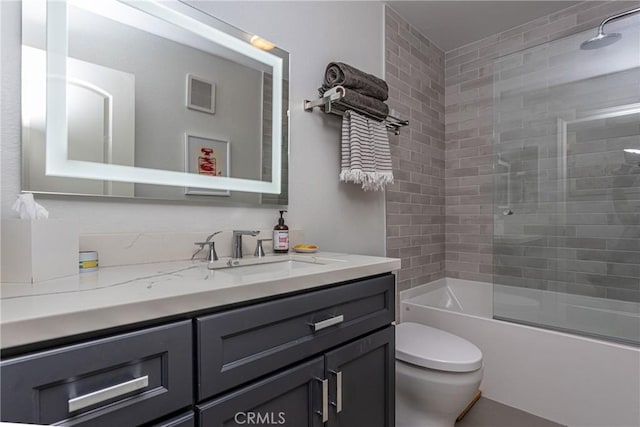 full bathroom featuring visible vents, shower / bath combination, vanity, and toilet