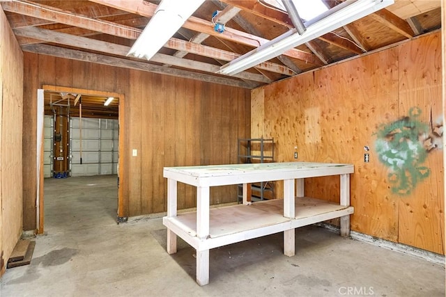 below grade area featuring wooden walls