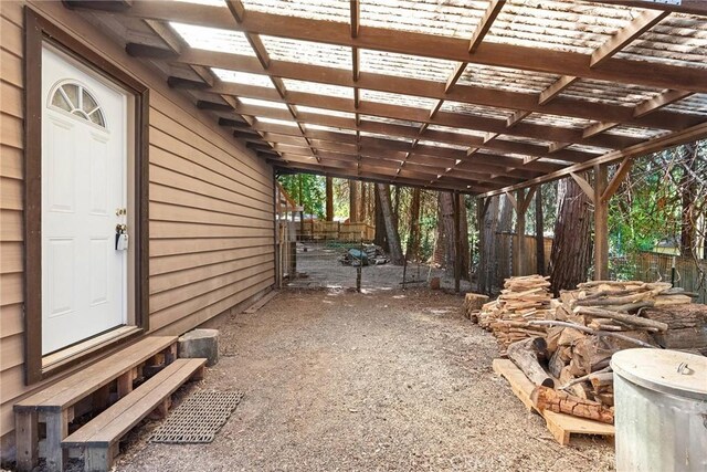 view of patio / terrace featuring fence
