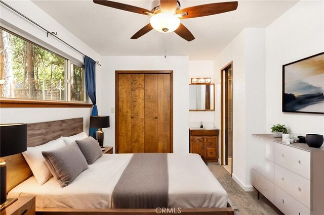 bedroom featuring a closet and ceiling fan