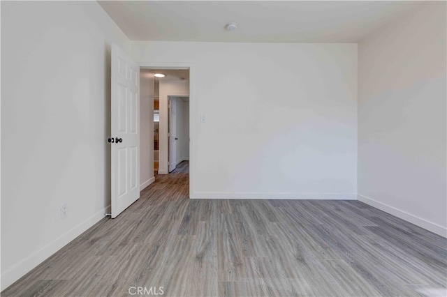 unfurnished room featuring light hardwood / wood-style flooring