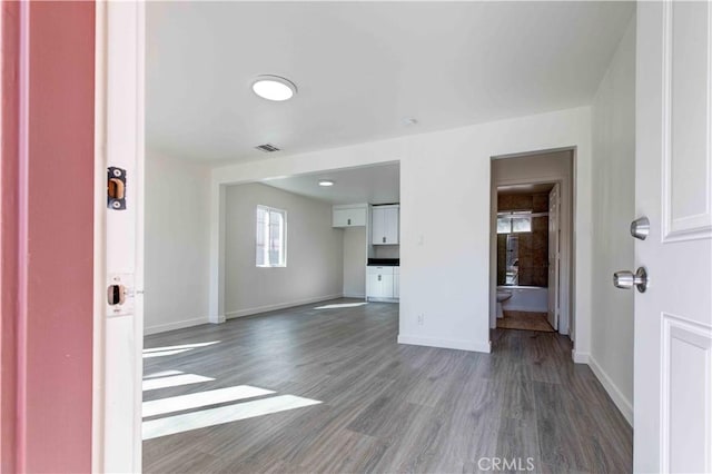 8812 Laurel Canyon Blvd, Sun Valley, CA 91352 - unfurnished living room featuring wood finished floors and baseboards
