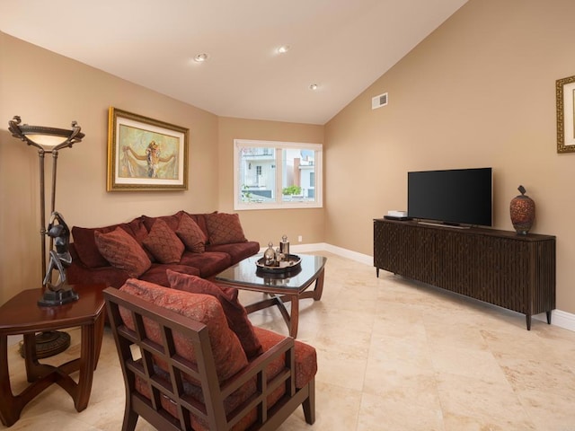 living room with lofted ceiling