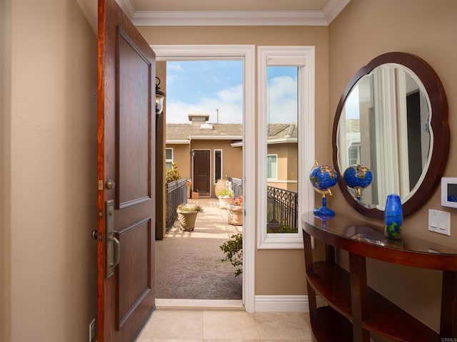 doorway with light tile patterned flooring and ornamental molding