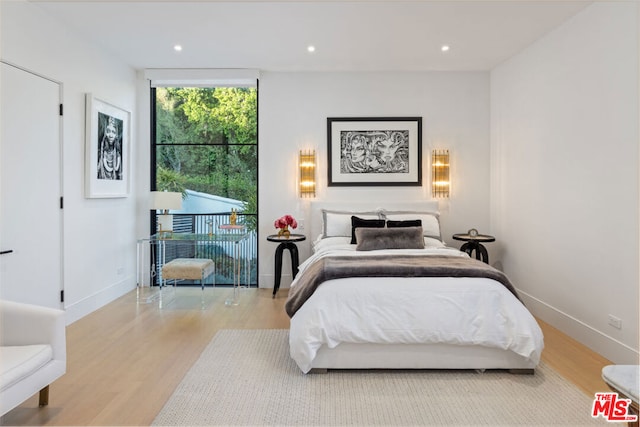 bedroom featuring light hardwood / wood-style flooring