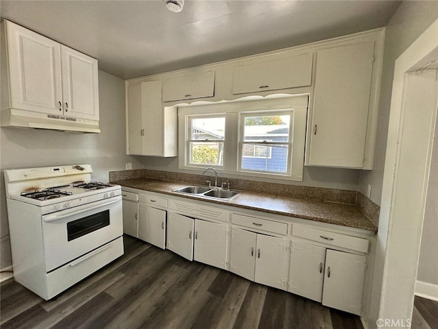 kitchen featuring sink, dark wood-type flooring, white gas range, and white cabinetry