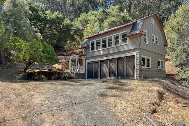 view of home's exterior with a garage