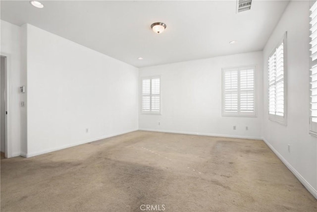 view of carpeted spare room