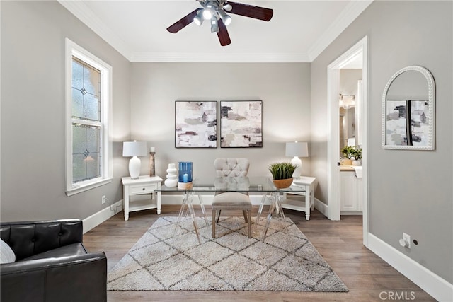 sitting room featuring crown molding, ceiling fan, and wood-type flooring