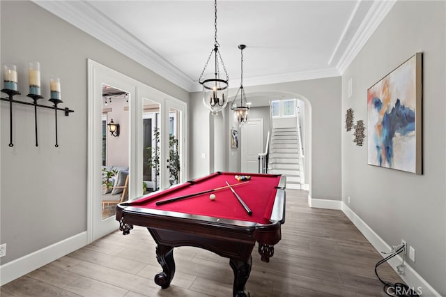 playroom featuring wood-type flooring, ornamental molding, and pool table