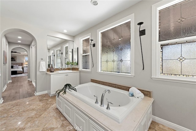 bathroom featuring a bathtub and vanity