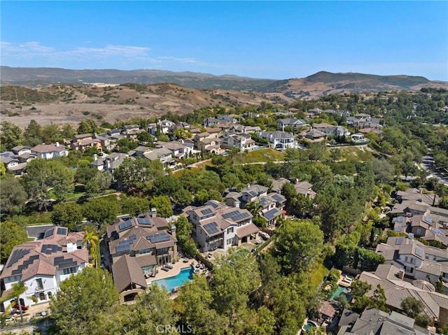 drone / aerial view featuring a mountain view