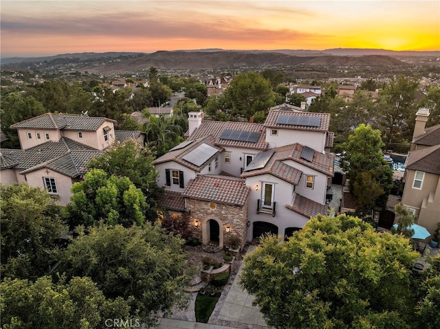 view of aerial view at dusk