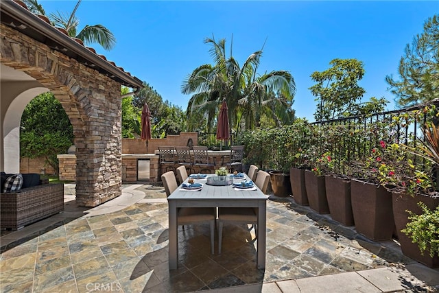 view of patio with an outdoor kitchen