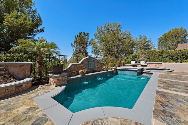 view of pool featuring a patio area