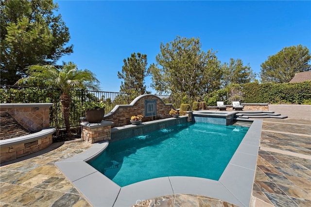 view of swimming pool featuring a patio