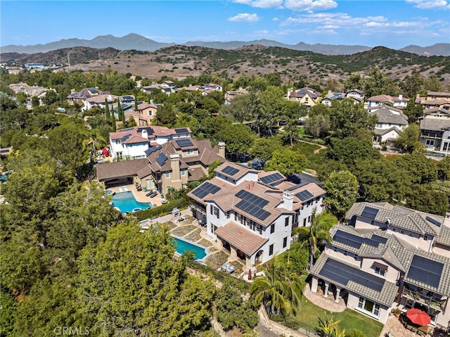 bird's eye view with a mountain view