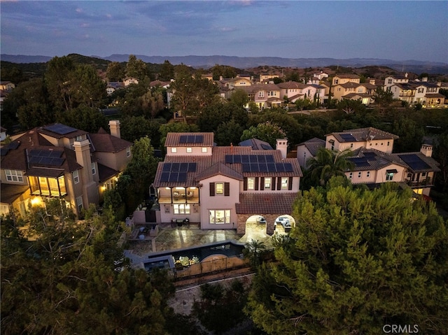 view of aerial view at dusk