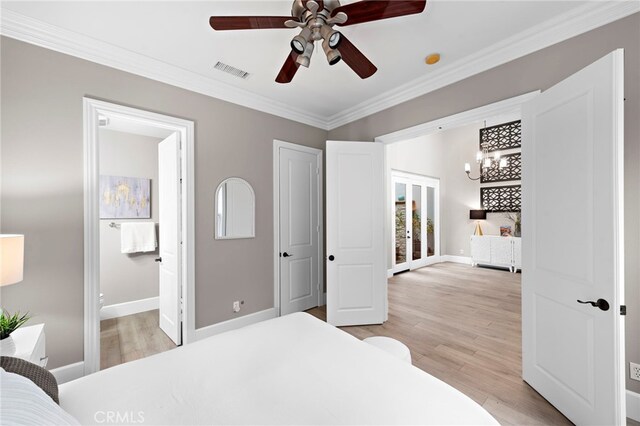 bedroom with french doors, ornamental molding, ceiling fan, and light hardwood / wood-style flooring