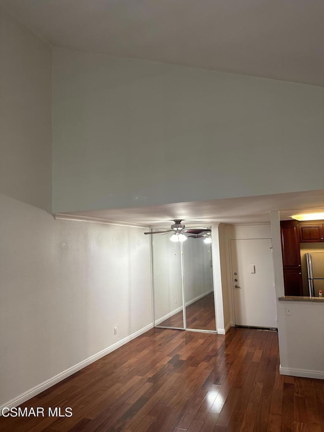 interior space with ceiling fan and hardwood / wood-style flooring