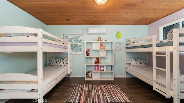 unfurnished bedroom with a wall unit AC, wooden ceiling, and dark hardwood / wood-style floors