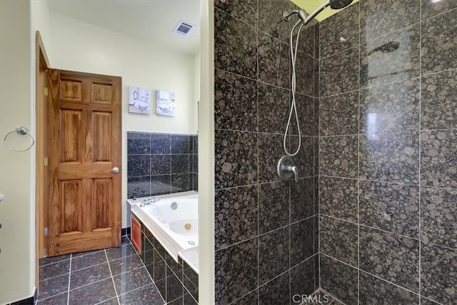 bathroom with tile patterned floors