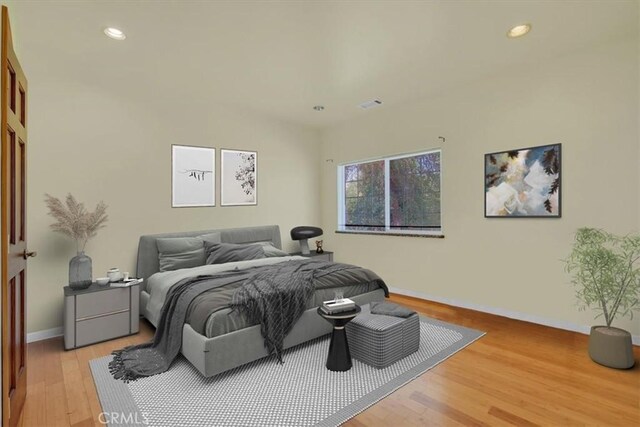 bedroom featuring light wood-type flooring