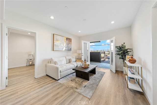 living room with light hardwood / wood-style floors