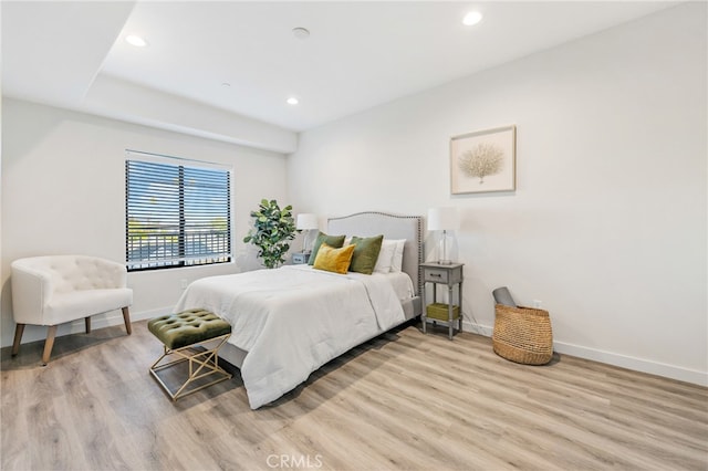 bedroom featuring light wood-type flooring