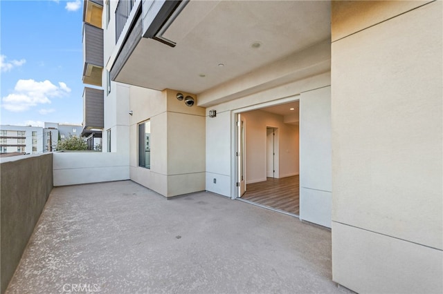 view of patio with a balcony