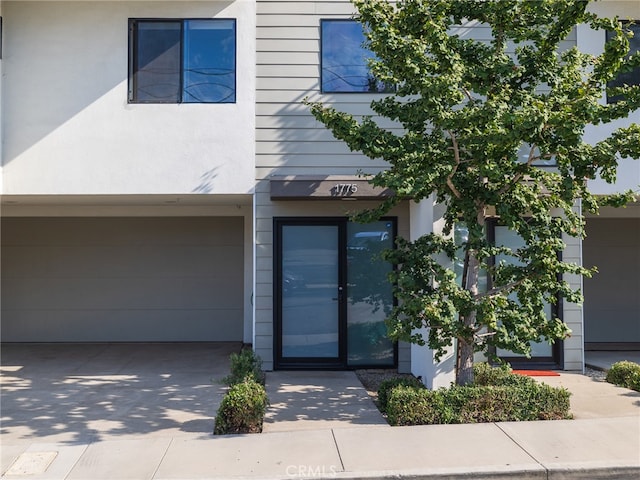 entrance to property featuring a garage