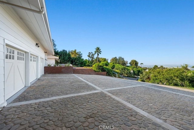 exterior space with a garage