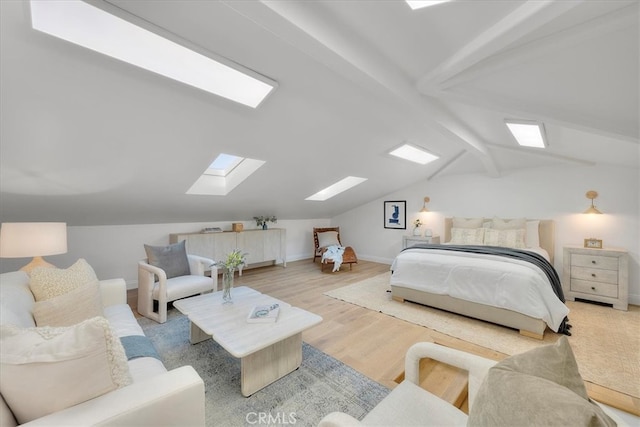 bedroom with vaulted ceiling with beams and wood-type flooring