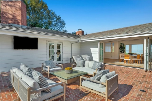 view of patio / terrace featuring french doors and an outdoor living space