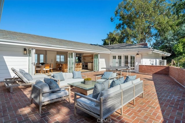 view of patio / terrace with french doors and outdoor lounge area