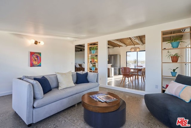 living room featuring an inviting chandelier, wood ceiling, and beam ceiling